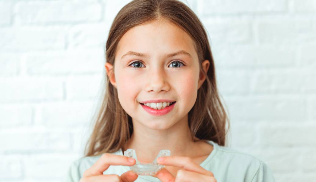 Young girl with Invisalign